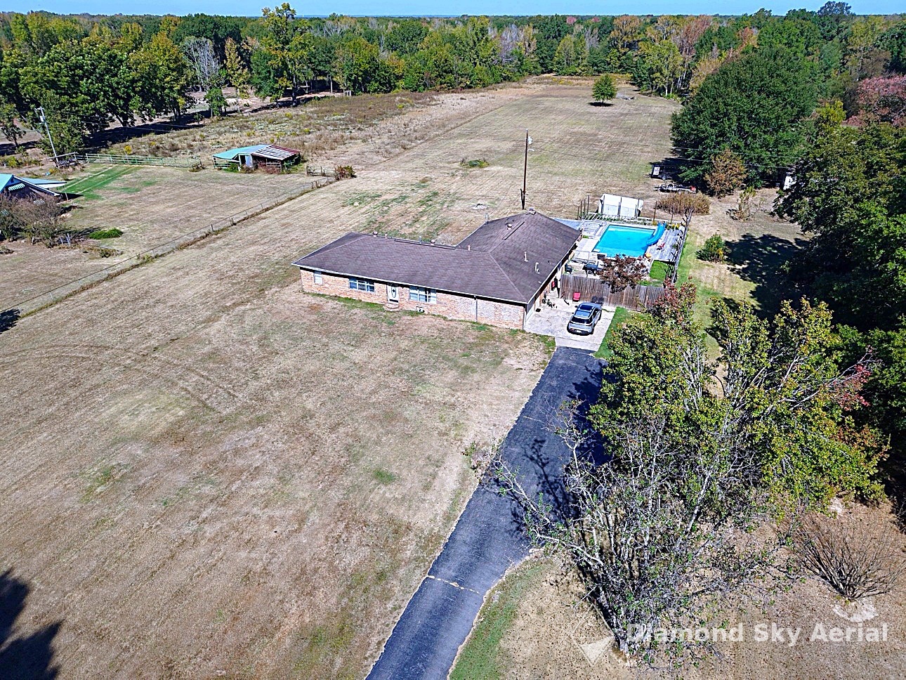Aerial front view of a brick home